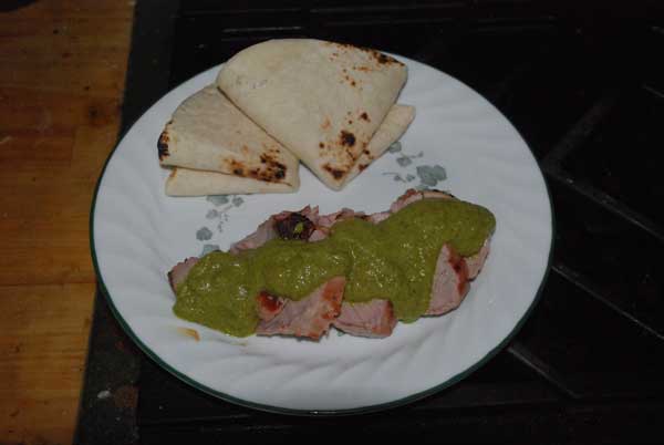 Pork, green sauce, tortillas